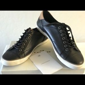 Used Coach Black Perkins Soft Port Sneakers.